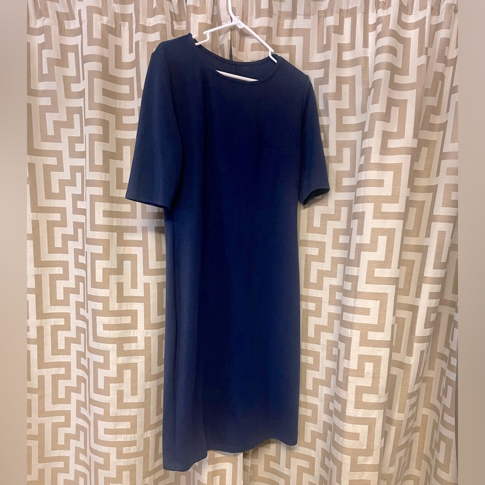 Navy blue mini dress with quarter length sleeve.